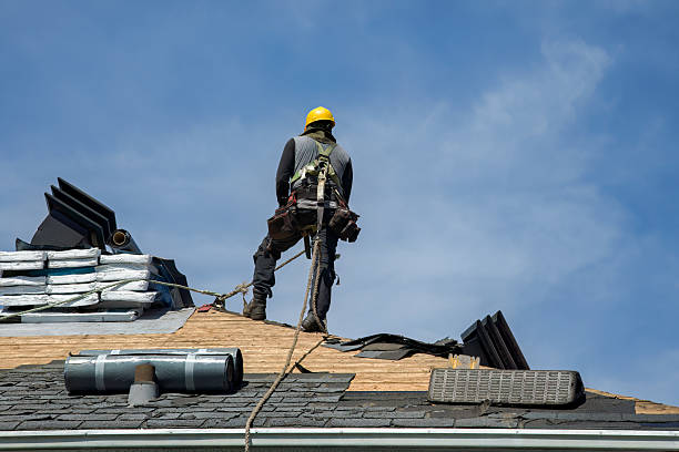 Professional Roofing technician working in Baldwin, IA